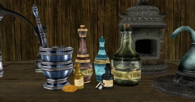 Arrangement to show scale of the bottles in relation to alchemy equipment & potion bottles