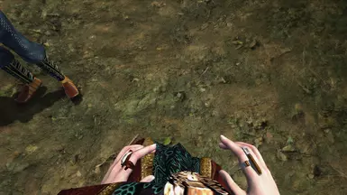 Breton Spellsword readies a spell. (Better Robes, OpenMW Visible Rings patch)