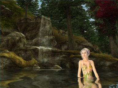 My Alba takes a bath near the waterfall