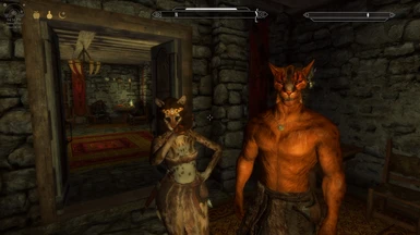 Player (UNP female) and Bikhai (SAM male) of Khajiit Will Follow, in bare-top fur armor