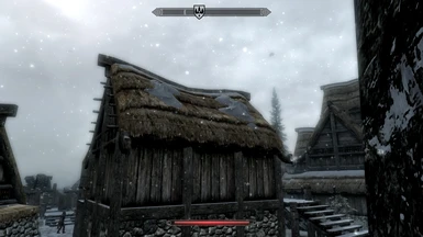Snow piling up on Winterhold rooves 3