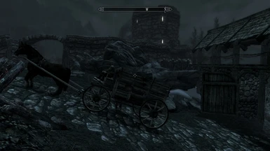 Inside Helgen North Gate with carriage in rain
