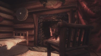 Comfortable bed near fire place