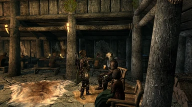 Bosmer talking to a seated Argonian