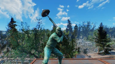 Fighting with barbells is so cool they made a statue out of it!