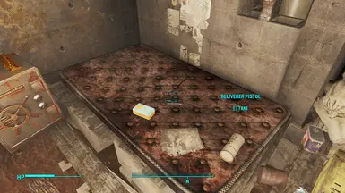 Found in the basement shelter in Sanctuary, behind one of the ruined houses.