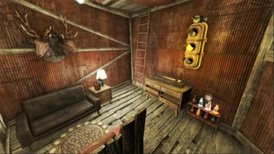A loft area, complete with a Nuka-Cola display rack, baseball memorabilia, and a Radstag head (though its eyes seem to follow you wherever you go)