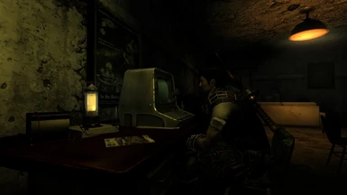 CI Operative sitting at a desk, in the second floor of the Liquor Hole