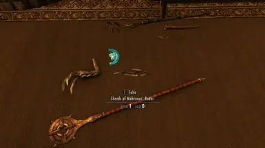 Various quest items dropped on the floor, including the Golden Claw, the Shards of Mehrunes' Razor, and Pantea's Flute.