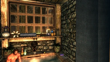 Washing the dirt and grime off in a cozy windowed bathroom with toggled on off water