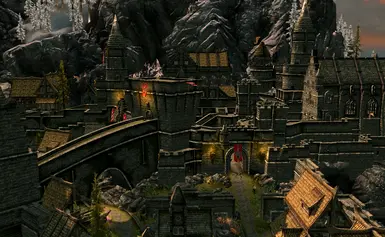 You can see some of the added buildings right above the wall and in the lower left corner.