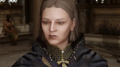Breton.  The sculpt is 'Colette Marence' from khisartin's NPC mod. Aging diffuse map with Mature normal map.