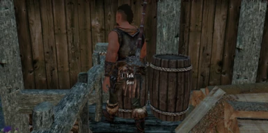 He gets stuck walking against the barrel, then goes right through it like a ghost. Pretty unimmersive to witness.