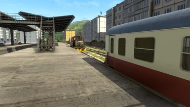 A Cream and Crimson Lake coach just finished being shunted