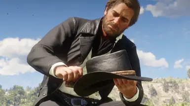 AM cleaning his hat