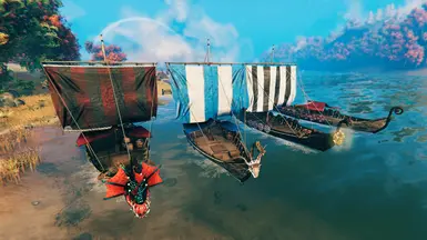 Some customized longships. Custom sails and shields.