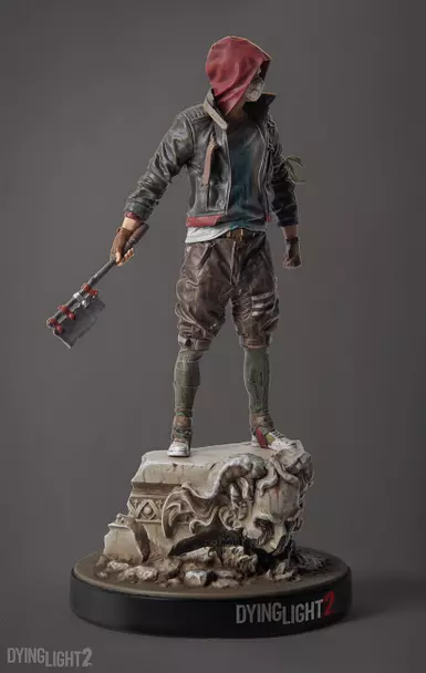 The figurine from 2019, and what the outfit was based on.