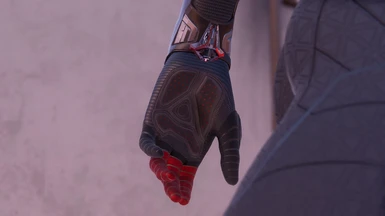 Darker Red color on Web shooter and Glove
